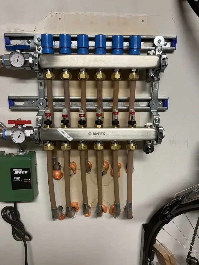 Plumber performing Water Heater Repair at a residential property in Chisago City